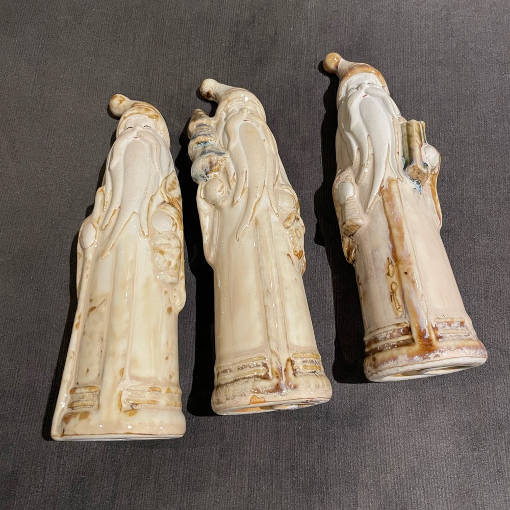 Set of Three Ceramic Santa Figurines